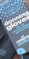 product / CompressionStockings.com garment donning gloves / hang tag